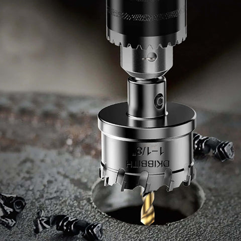 4-piece tungsten carbide hole saw set mounted on drill, 3/4"–1-1/2" sizes, 1" cut depth.