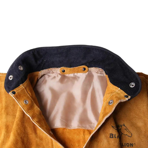 Close-up of Split Cowhide Welding Jacket with Stand Up Corduroy Collar, satin lining visible, for sparks, heat, and spatter protection.