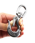 Premium Pro Grade 304 Stainless Steel Swivel Eye Lifting Hook Delivering Smooth 360 Degree Spin And Built Like A Tank For 150 Kg Rigging Jobs In 3/16 Inch Size held in hand.