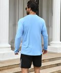 Man wearing blue long sleeve from Two Pack Men's UPF Fifty Plus Dope Rash Guard Long Sleeve Swim Shirts With Quick Dry Tech