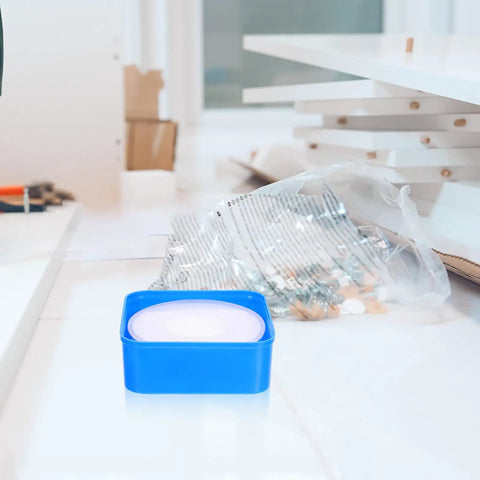 Top Shelf PTFE Adhesive Seal Tape 10 Rolls Of Water Leak Repair Wrap For Pipes And Threads Gonna Save Ya Time With This Ninja Tight DIY Plumbing Fix Daily on a work surface.