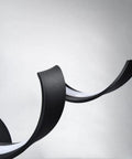 Close-up of spiral design on Dimmable 24 Inch Black LED Vanity Light With Dope Spiral Design For Over Mirror Install Modern Bath Lighting Fixture 15W