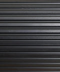 Close-up of black corrugated surface of Indoor Outdoor Rubber Scraper Mat For High Traffic Areas 36 Inch By 6 Foot Heavy Duty Doormat