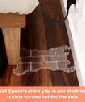 Two Pack Clear Acrylic Sofa Wall Spacers Keep Paint Fresh And Block Deep Scratches With Reusable Invisible Gap Push Backers That Lock Couches Tight To Walls For A Dope Home Setup, shown placed behind a sofa.