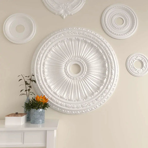 Ceiling Medallion With Thirty Five And One Eighth Inch Outer Diameter And Four And Seven Eighth Inch Inner Opening, displayed on wall