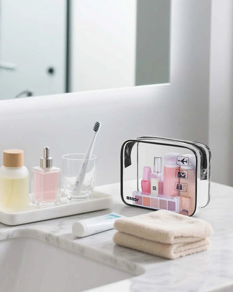 Clear Travel Toiletry Bag Set For Grab And Go TSA 3 1 1 Quart Size With Zipper Pouches Leakproof on bathroom counter