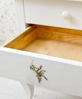Antique Mantis Cabinet Pulls And Drawer Knobs For Dresser Closet Cupboards And Doors In Coffee Brass Finish on white drawer