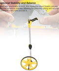 12 Inch Folding Mechanical Measuring Wheel Straight Up Reliable Metric Distance Tracker With Portable Carry Handle shown standing with yellow wheel.