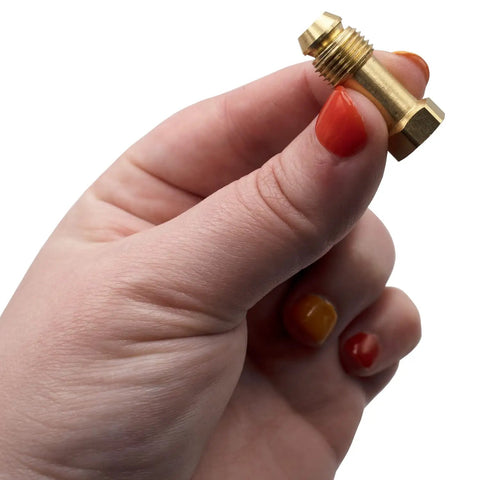 Hand holding Low Capacity Millivolt Gas Valve 1/2 Inch By 1/2 Inch, Compact Replacement Valve For Gas Furnaces, Ranges, And Fireplaces