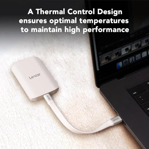 ES5 Magnetic External SSD 1TB Ultra Fast 2000 MB Per Second Read And Write attached to laptop via USB-C cable
