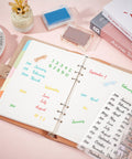 Clear Calendar Date Number Stamps For Card Making And Bullet Journaling Premium Transparent Silicone Stamps on planner open to month layout.