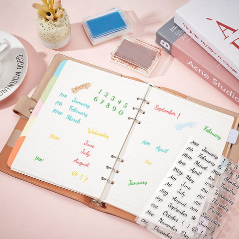 Clear Calendar Date Number Stamps For Card Making And Bullet Journaling Premium Transparent Silicone Stamps on planner open to month layout.