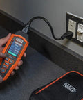 RT390 Circuit Analyzer With Large Color LCD For Quick, No Nonsense Wiring Fault Checks, AFCI And GFCI Tester, Voltage Drop Measurement, And Real Time Trip Time Display in use at electrical outlet.