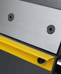 Close-up of hinge mechanism on 24 Inch Box And Pan Metal Brake With Removable Fingers for DIY pros, showing screws and yellow edge.