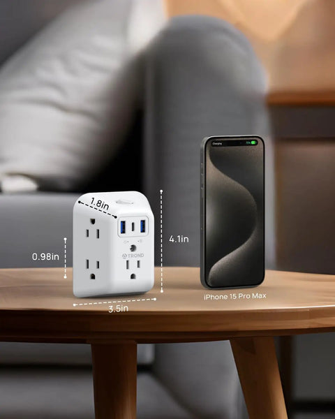 5 Outlet USB Wall Plug Extender With USB C Port And 1440J Surge Protector On Off Switch next to smartphone on table
