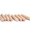 8 visible pieces from the 1000 Piece Five Sixteenth Inch Wooden Dowel Pins Set For Woodworking, straight, fluted, beveled, tapered ends.