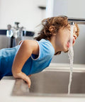 Child drinking water from faucet using 10 Pack Faucet Aerator Replacement Inserts With Rubber Washers M22 M24, Water Saving Sink Aerators.