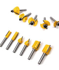 Quarter Inch Shank One Hundred Piece Set Tungsten Carbide Router Bits For Woodworking Milling Cutter Projects With Badass Durability And Killer Precision Cuts Daily, displayed in a row with multiple shapes and sizes.