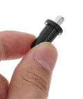 Spring Loaded Cabinet Door Pins Replacement Kit For Shutters And Furniture Easy Install Durable Iron And Plastic Pins 50 Pack Secure Fit For Cabinet Doors Hinges And Diy Repair Projects, close-up in hand