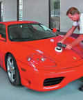 Man using Powerful 4.5 Amp 6 Inch Orbital Sander And Polisher With Variable Speed 2,500 To 6,800 OPM on a red car