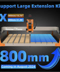FoxAlien Masuter 3S CNC router with orange frame and blue workpiece, 3-axis engraving milling machine, front view