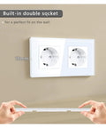 Built Tough Dual Schuko Wall Socket Slick Tempered Glass Panel No Fuss Child Proof Shield 16 Amp 3500 Watt Heavy Duty Power Outlet installed flush against wall.