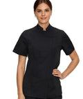 Women Short Sleeve Chef Coat In Sleek Black Legit Culinary Jacket With Heavy Duty Cotton Poly Blend. Stylish fit with mesh detail.