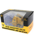 604R Round Hay Baler Diecast Model With Hay Bale One Sixty Fourth Scale For Collectors in packaging, ideal for display.