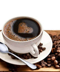 Coffee cup with heart-shaped foam next to a Demitasse Espresso Spoon Set Of 6, Mini Stainless Steel Coffee Spoons For Tea Dessert And After Dinner.