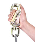 Hand holding swivel snap hook of Tree Climbing Lanyard Kit Pro Grade With Steel Wire Core Flip Line Rope 1/2 Inch By 10 Feet