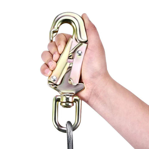 Hand holding Tree Climbing Positioning Lanyard 1/2 Inch By 10 Foot Steel Wire Core Rope with swivel snap hook.