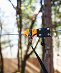 60Ft Zipline Brake System With Heavy Duty Bungee Cords And Plastic Brake Block installed on a zipline among trees