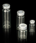 Four 2mL transparent glass sample vials with silver caps