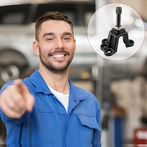 Friendly mechanic in blue coveralls with a Heavy Duty Universal Hub Puller For Brake Drum Removal And Seized Bearing Extraction Four And A Half Inch Jaw Opening Tough Carbon Steel.