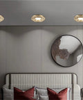Snag These Premium 9 Pack Led Recessed Lighting Trim Kits in a modern interior with decorative trim and a round mirror.