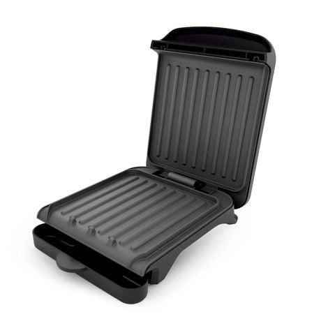 Ovente Two Serving Electric Indoor Grill And Panini Press Compact Contact Maker For Juicy Steaks Bold Smoky Flavor No Outdoor Mess Black Kitchen Appliance open, nonstick surface.