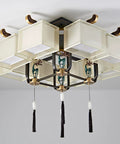 Chinese Motif Ceiling Pendant Light With Modern Fabric Shade And Classic Enamel Design Delivers Straight Up Cozy Ambiance Paired With Efficient Led Bulbs Perfect For Bedrooms Dining Nooks Or Trendy Cafes To Level Up Any Space Big Time, featuring a square fabric shade and decorative tassels.