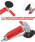 4-inch water-jet pneumatic grinder with red handle and black polishing pad for marble and stone