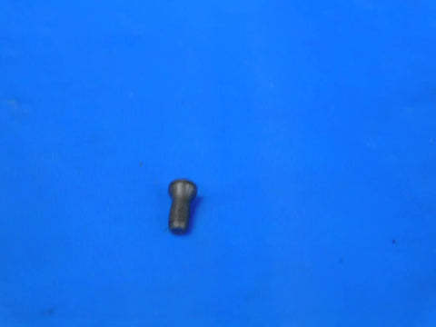 Universal Indexable Insert Retaining Screw Designed For Cnc Lathes And Milling Tools on blue background, showing its compact design.