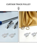 Smooth Operation Curtain Track Pulley Set Featuring Rock Solid Plastic Double Wheel Rollers For Seamless Sliding On Straight Or Curved Tracks Zero Hassle Easy DIY Fix with rollers and hooks on a gold fabric.
