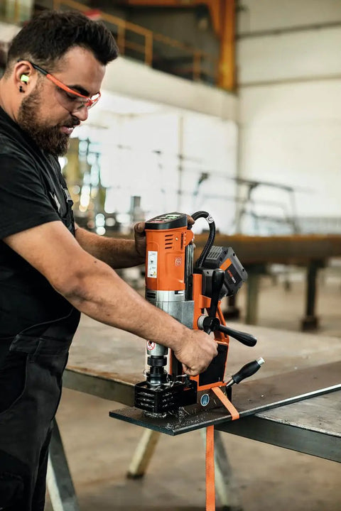 Built Tough Cordless Universal Base Drill With A Lightning Fast Brushless Motor And An Extended Stroke Range designed for precision drilling in steel.