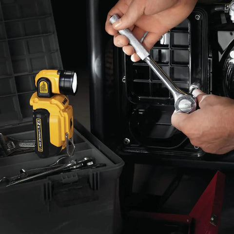 Go To Portable 12V Max LED Work Light With Magnetic Mount And Kickstand placed next to a toolbox, used in garage.
