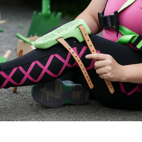 Knee Saver Knee Pads For Work And DIY with green cushioned support and non-slip straps in use for gardening.