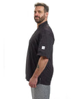 Side view of Badass Short Sleeve Chef Jacket In Sharp Black Features Double Breasted Front And Full Mesh Back For Sweet Kitchen Airflow Built From Tough Poly Cotton Twill That Fights Wrinkles And Holds Up Daily In Comfortable 2XL.