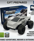 Cyber RC Toy Car For Kids One Eighteenth Scale Monster Truck With Two Point Four GHz Remote next to packaging