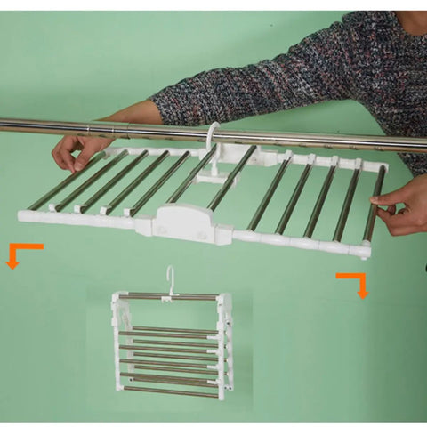 Heavy Duty Foldable Multi Layer Pants Hangers Crafted From Durable Stainless Steel shown being installed on a closet rod.