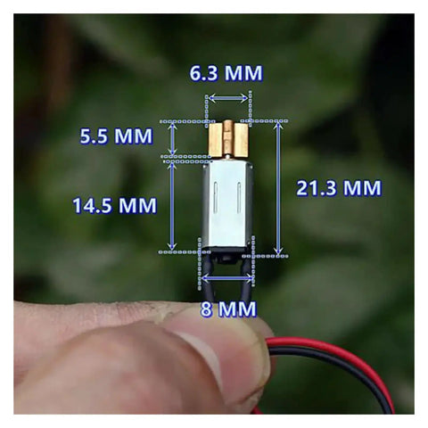 3V Mini Vibration Motor Ultra Compact 8mm By 14.5mm With Copper Eccentric Vibrator held in hand showing dimensions