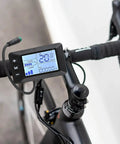 5 Pin E Bike Display For 24V 36V 48V Systems With G51 Color LCD Screen on a bicycle handlebar showing speed and battery status.