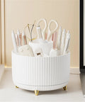 Rotating Six Compartment Desk Organizer For Makeup, Brushes, Skincare, Art Supplies And More, Perfect For Bathroom, Dresser, Countertop Or Kitchen Counter, Keeps Cosmetics, Brushes, Pencils And Markers Neat white 6-compartment organizer on gold feet with scissors and pens