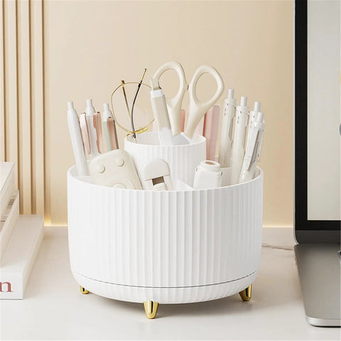 Rotating Six Compartment Desk Organizer For Makeup, Brushes, Skincare, Art Supplies And More, Perfect For Bathroom, Dresser, Countertop Or Kitchen Counter, Keeps Cosmetics, Brushes, Pencils And Markers Neat white 6-compartment organizer on gold feet with scissors and pens